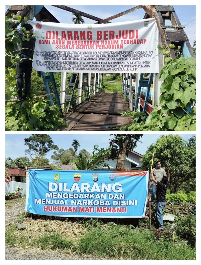 
					Kolase. Personil unit reskrim Polsek Pancur Batu Polrestabes Medan pasang spanduk larangan judi dan narkoba Pancur batu
