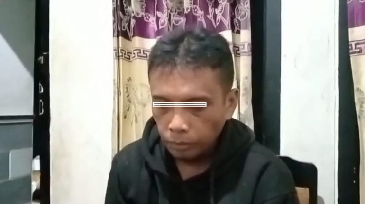 Tersangka IM (35 tahun)